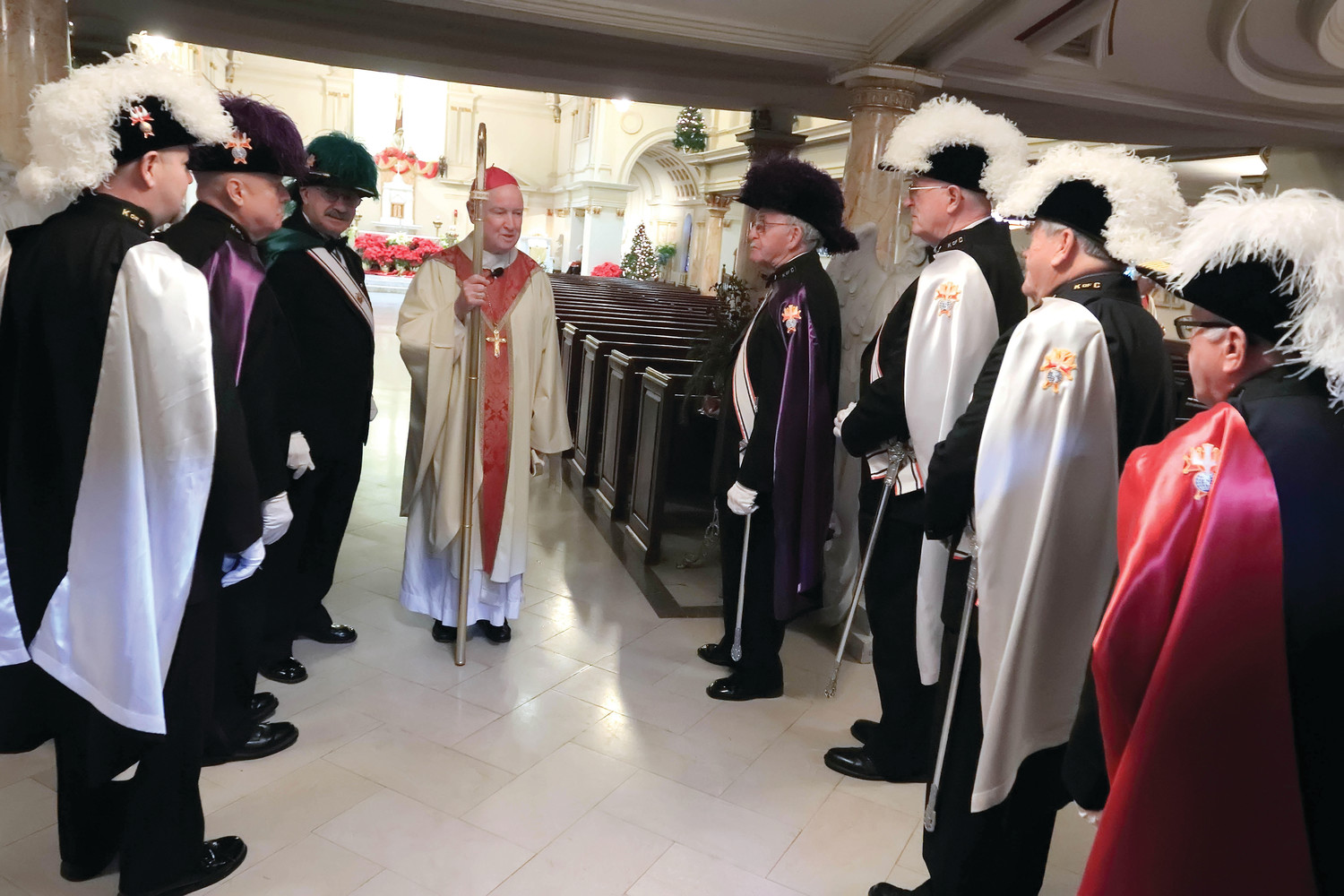 Bishop Malooly talks with members of the Knights of Columbus before the memorial Mass for Bishop Robert Mulvee at the Cathedral of Saint Peter Church, January 13, 2019.